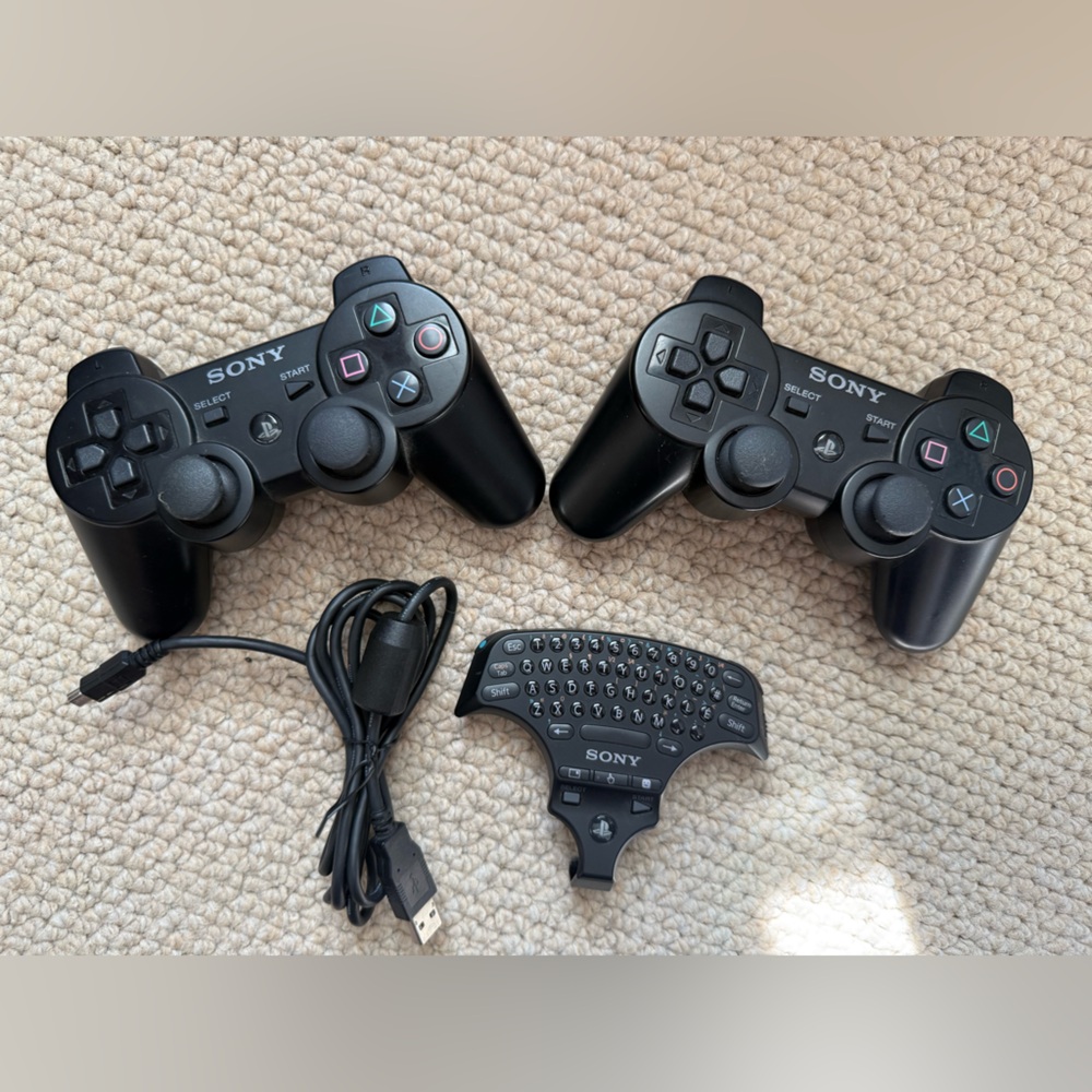 Sony Black PlayStation Wireless Game 2 Controllers PLUS a Keypad